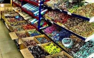 an alley of candies sold by weight in a supermarket