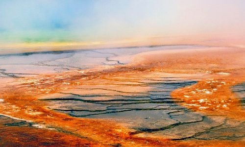 Grand Prismatic rings seen from the side